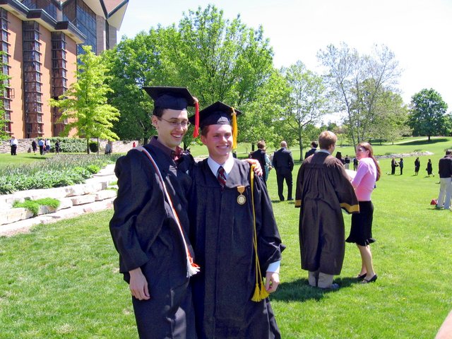 After baccalaureate, Caleb Sancken and Matthew Schaefer pose outside, south of the Chapel of the Resurrection.