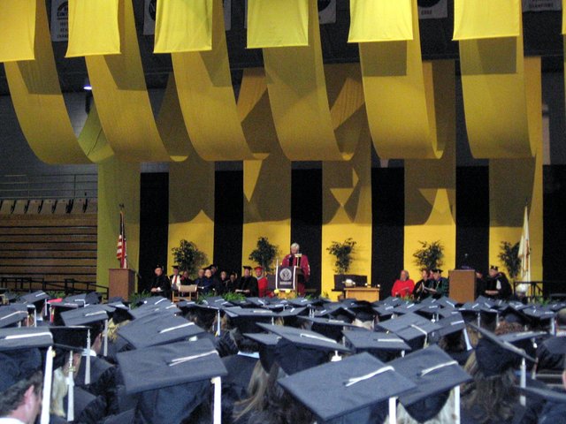 Myles Brand, Ph.D., President, National Collegiate Athletic Association, addresses those gathered at commencement. (From Gregory Sancken)